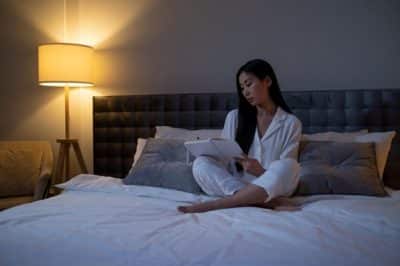 Woman sitting in bed